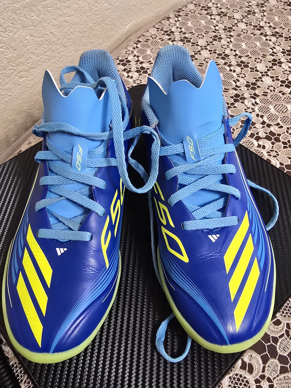 Blue Youth Soccer Cleats with Neon Yellow Accents